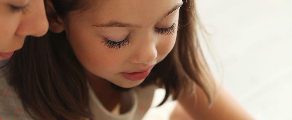 4 yr old girl on lap top.jpg