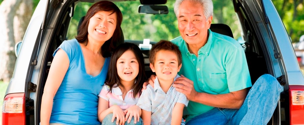 Grandparents with kids in the back of station wagon.jpg