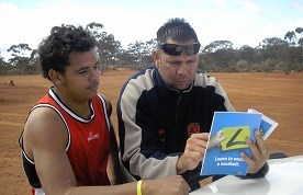 Father helping son with driving information